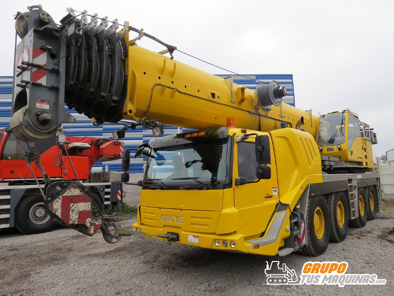 Conrad GROVE GMK 4100L-2 - 1/50 - Grue Jaune - Neuf